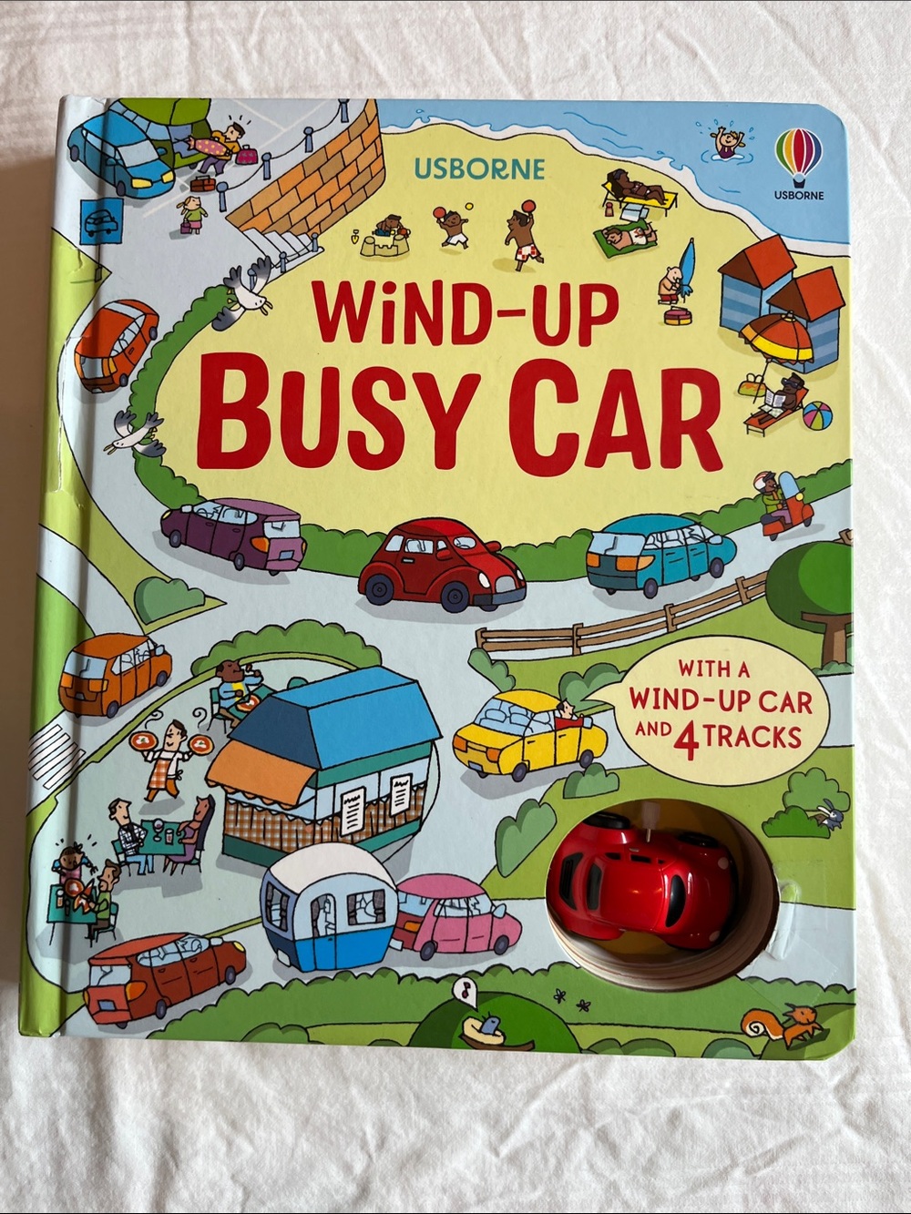 Usborne Wind-Up Busy Car Interactive Board Book with Red Car